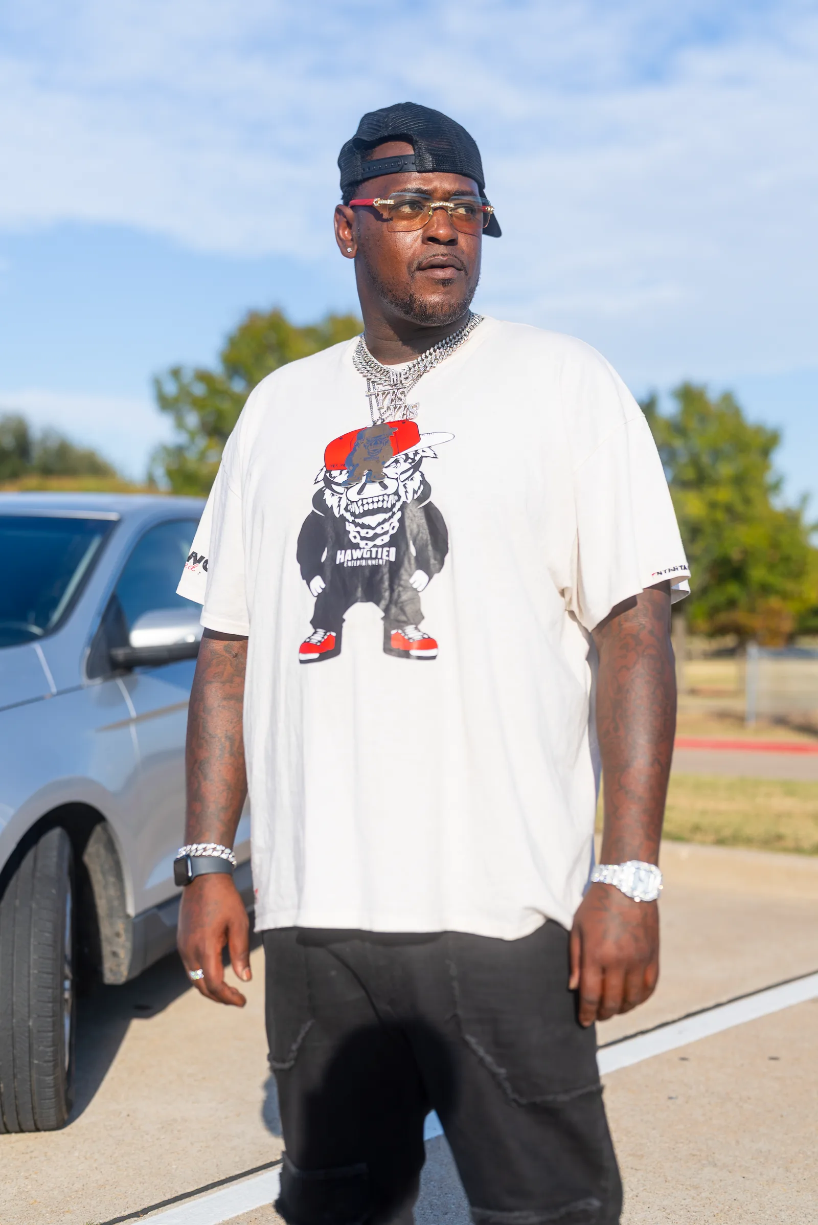 Yung Pr3tty wearing the HAWGTIED graphic tee